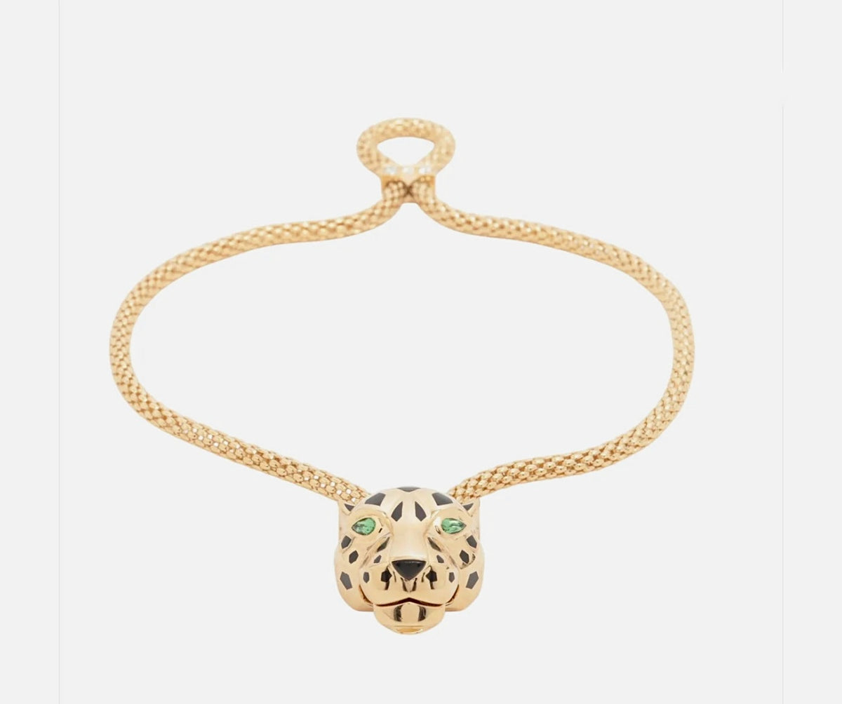 Cartier gold-tone panther-head bracelet with openwork design and green eye accents